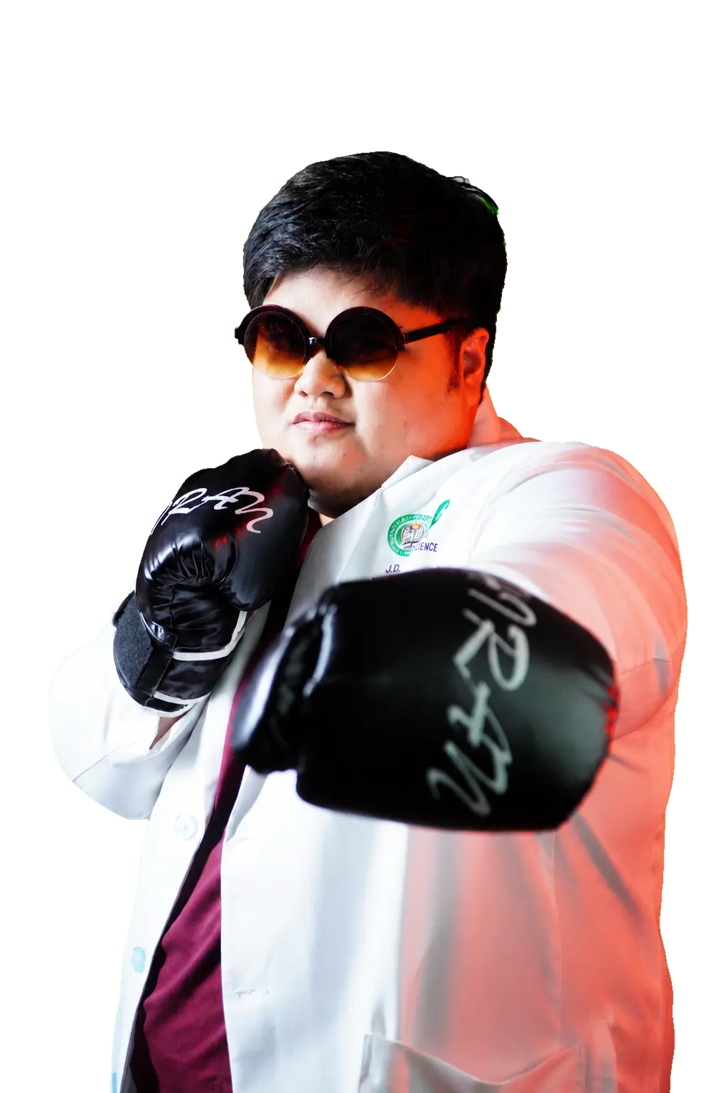 John Derrick Esguerra wearing a laboratory coat and boxing gloves