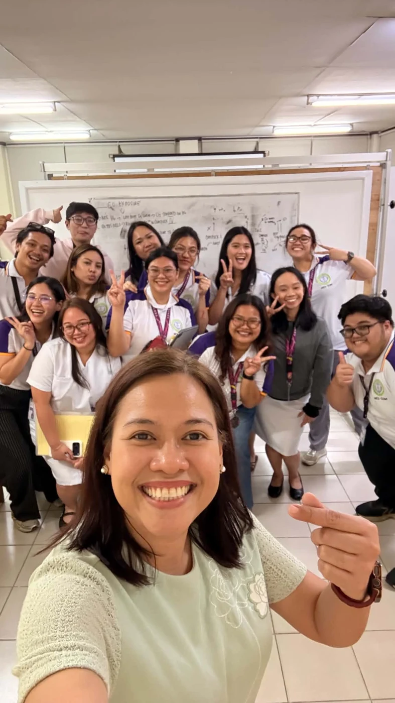 Derrick with classmates and the supervising doctor after the case discussion